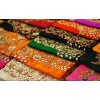stock-photo-closeup-of-indian-woman-salwar-kameez-dress-material-stacked-display-in-a-retail-shop-1641659620-transformed